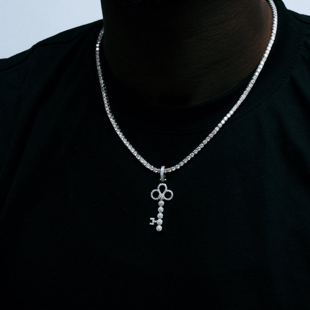 
                      
                        Sterling Silver Iced Out Key Pendant
                      
                    