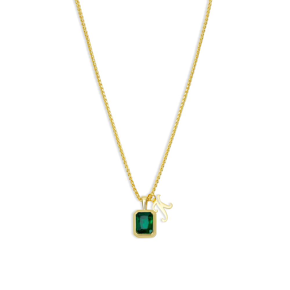 
                      
                        The Emerald Initial Gemstone Necklace
                      
                    