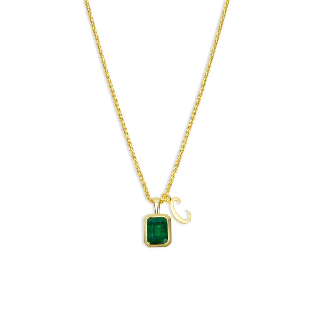 
                      
                        The Emerald Initial Gemstone Necklace
                      
                    